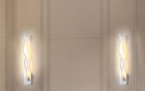 Twisty Spiral LED Wall Sconce in matte white mounted on wall